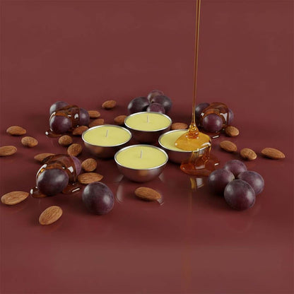 Set da 4 ricariche candela Aura Effusione formato S fragranza Uva Rara in alluminio con note fruttate e legnose.